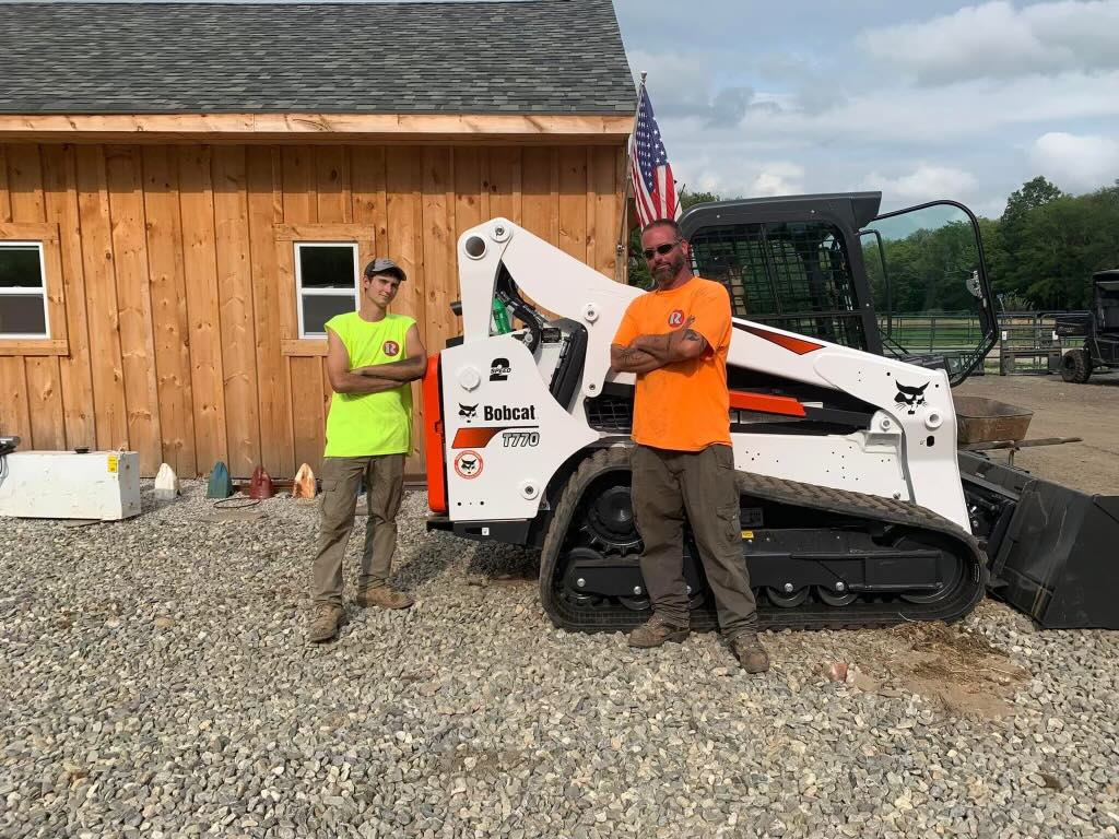 DJ and Trevor Roberts with Bobcat T770 - Roberts Construction Company